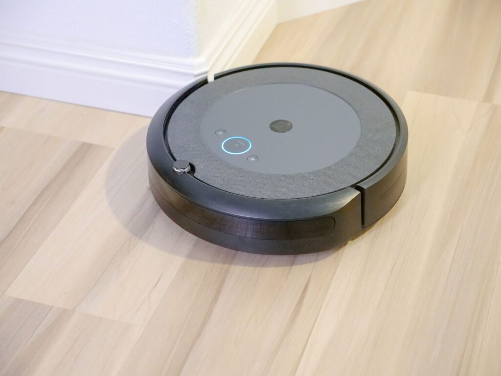 Robotic vacuum cleaner operating on hardwood floor for best robot vacuum India 2026