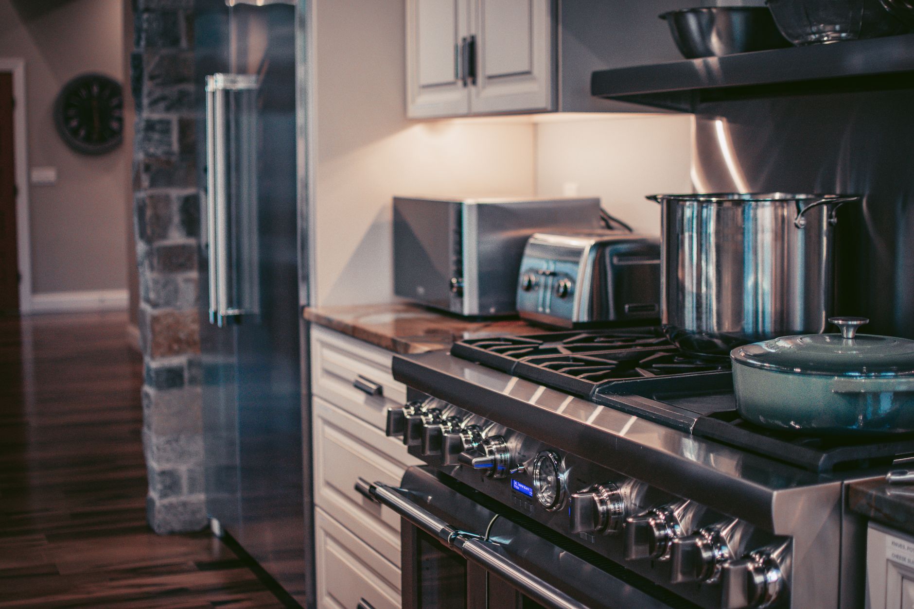 Stylish modern kitchen showcasing stainless steel appliances and elegant decor — ideal setting for an RO water purifier.