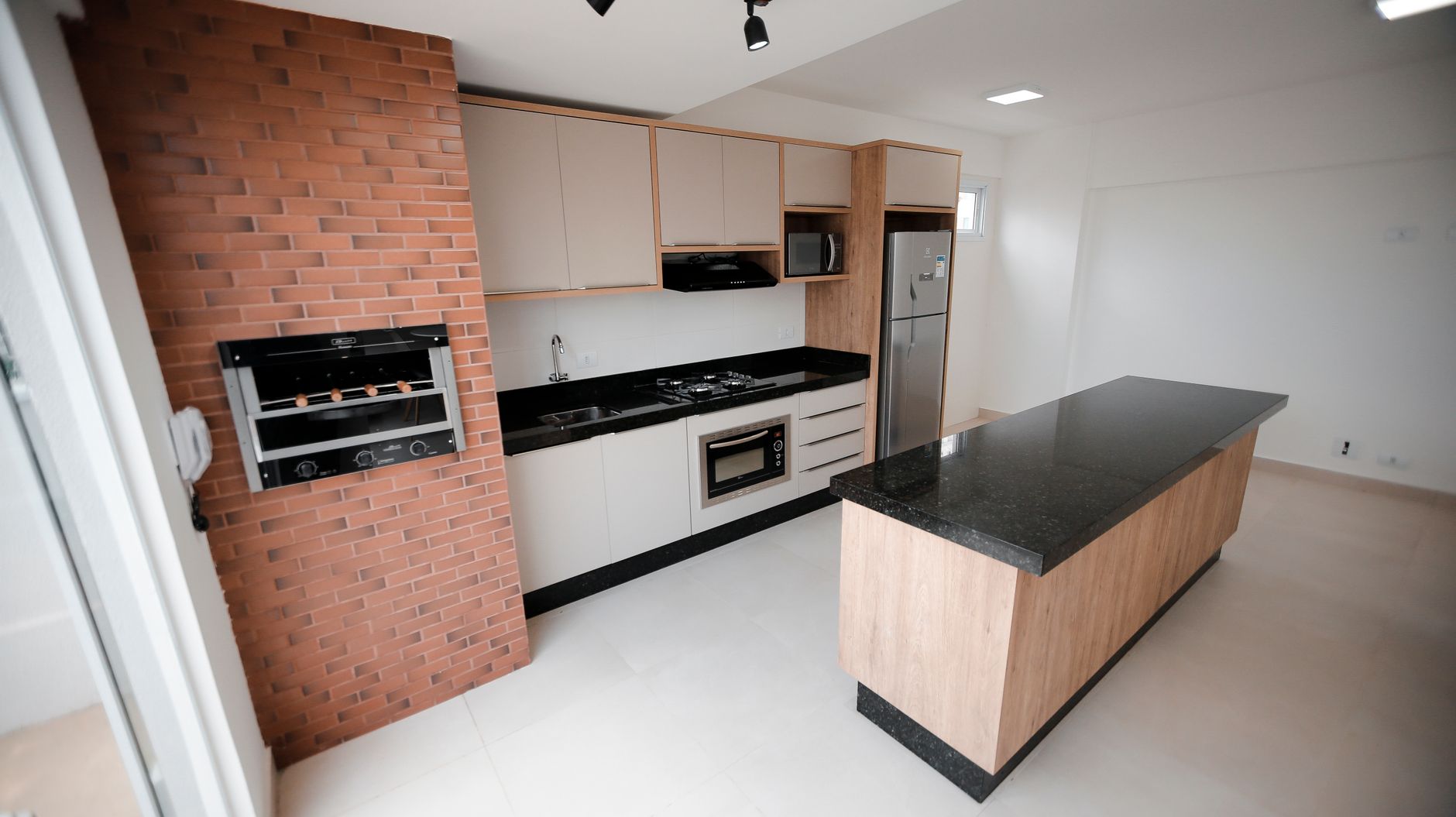 Contemporary Indian kitchen with induction cooktop and modern countertop