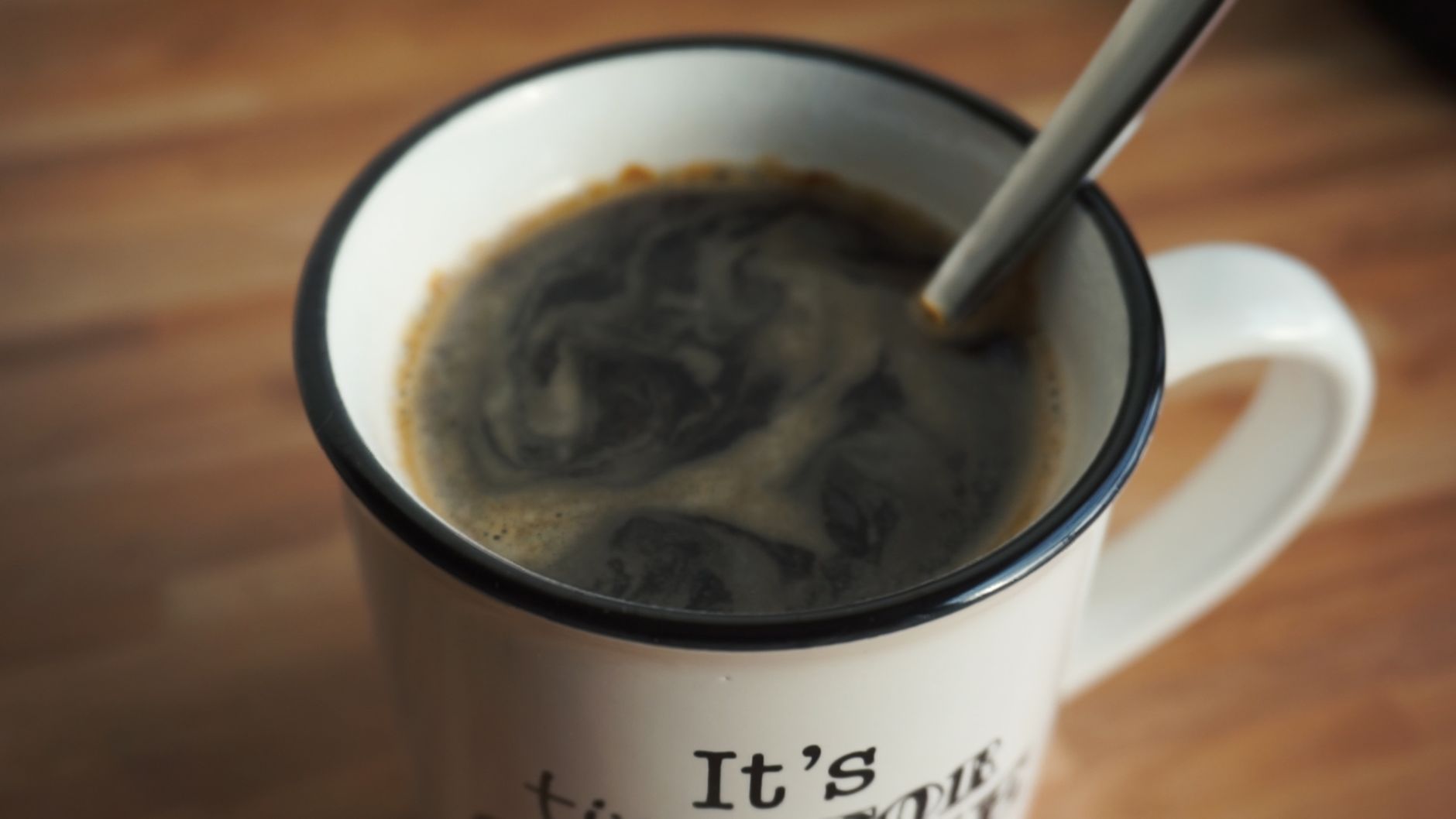 Hot black coffee in white mug for morning coffee ritual
