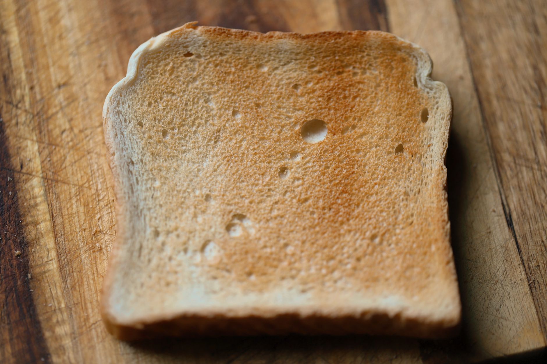 Toasted white bread slice ready for serving, perfect result from a quality sandwich maker