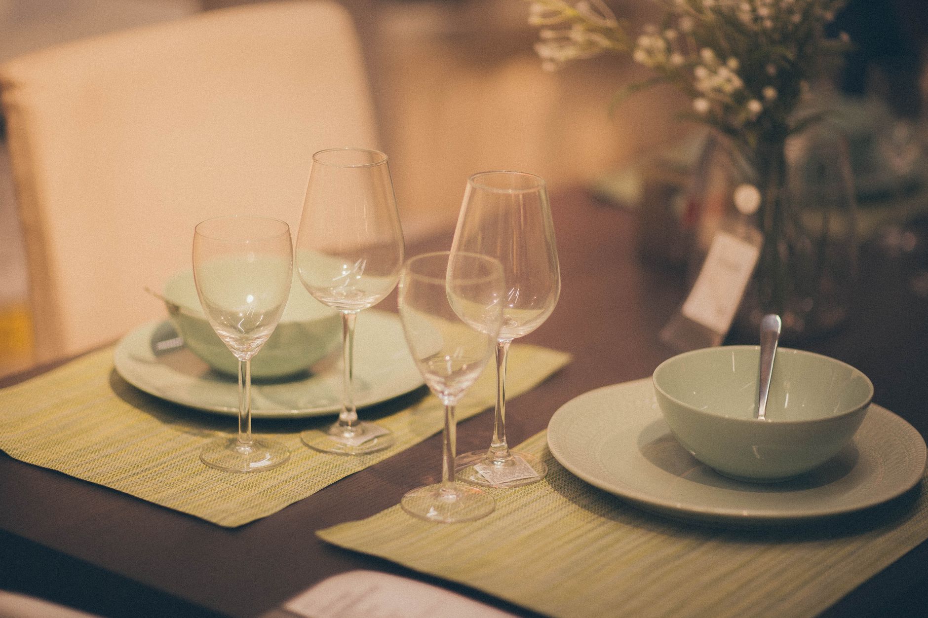 Stylish indoor dining table with elegant plates and glasses — the kind of setup the right dinner set can create at home