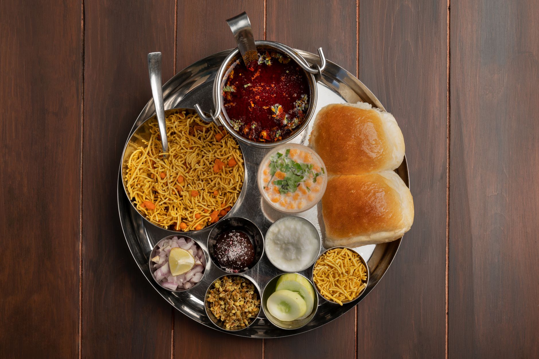 Traditional Indian thali and plate arrangement — the style of dining Borosil Tondo dinner sets are designed for