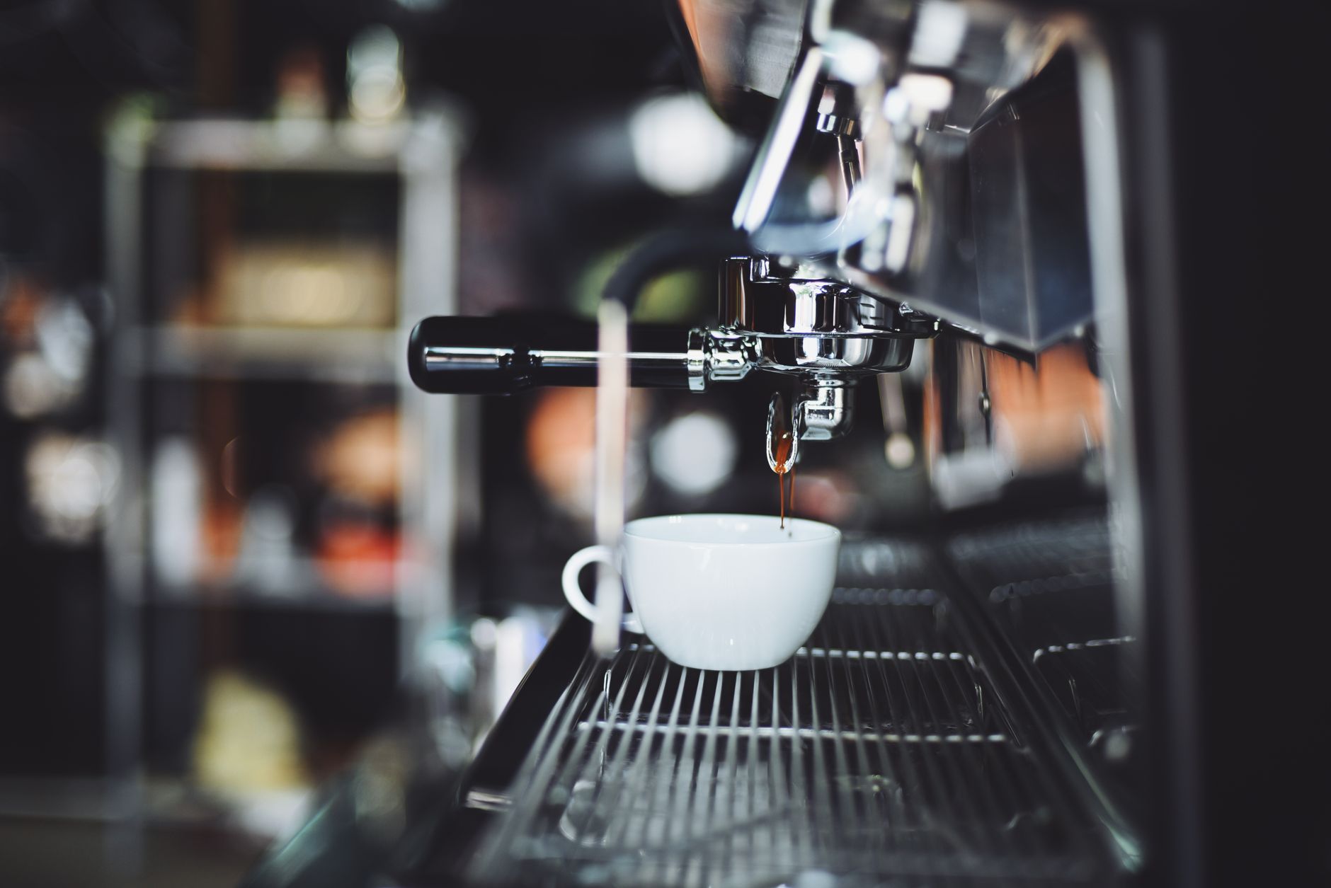 Espresso machine brewing concentrated coffee shot
