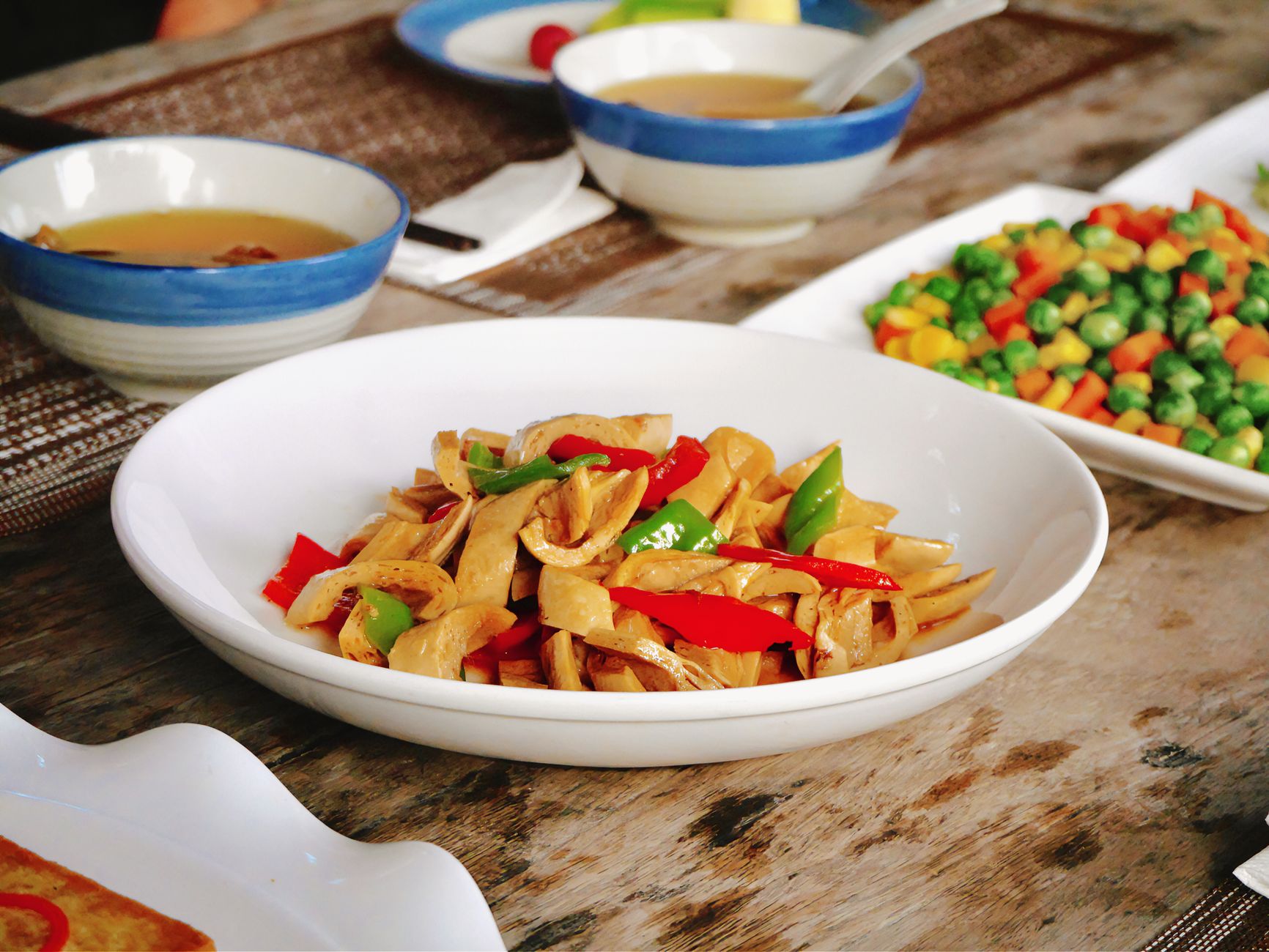 Colourful melamine-style dinnerware in vibrant shades — the type of look found in Solimo melamine dinner sets