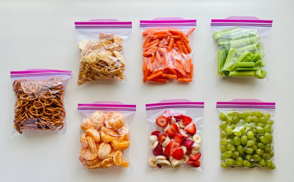 Assorted fruits and vegetables packed in sealed zip lock bags for freshness - vacuum food sealer results