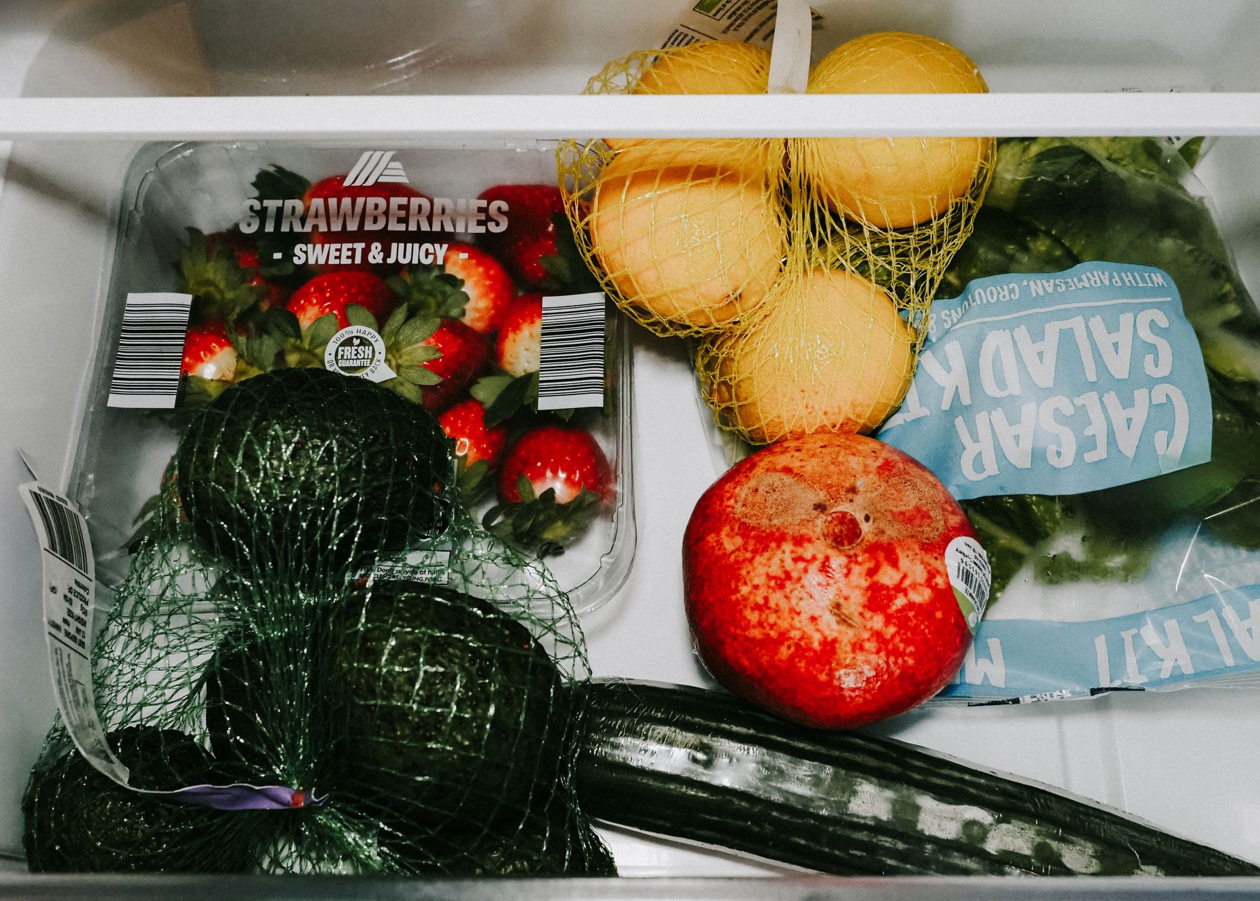 Fresh fruits and vegetables in fridge drawer - a vacuum sealer like the Aobosi helps keep produce like this fresher longer