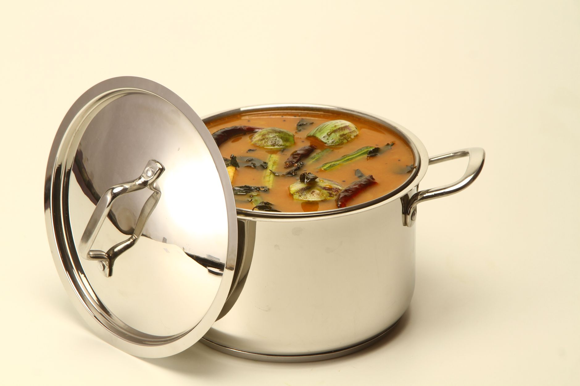 South Indian sambar in stainless steel pot showing the kind of food best kept in insulated casseroles