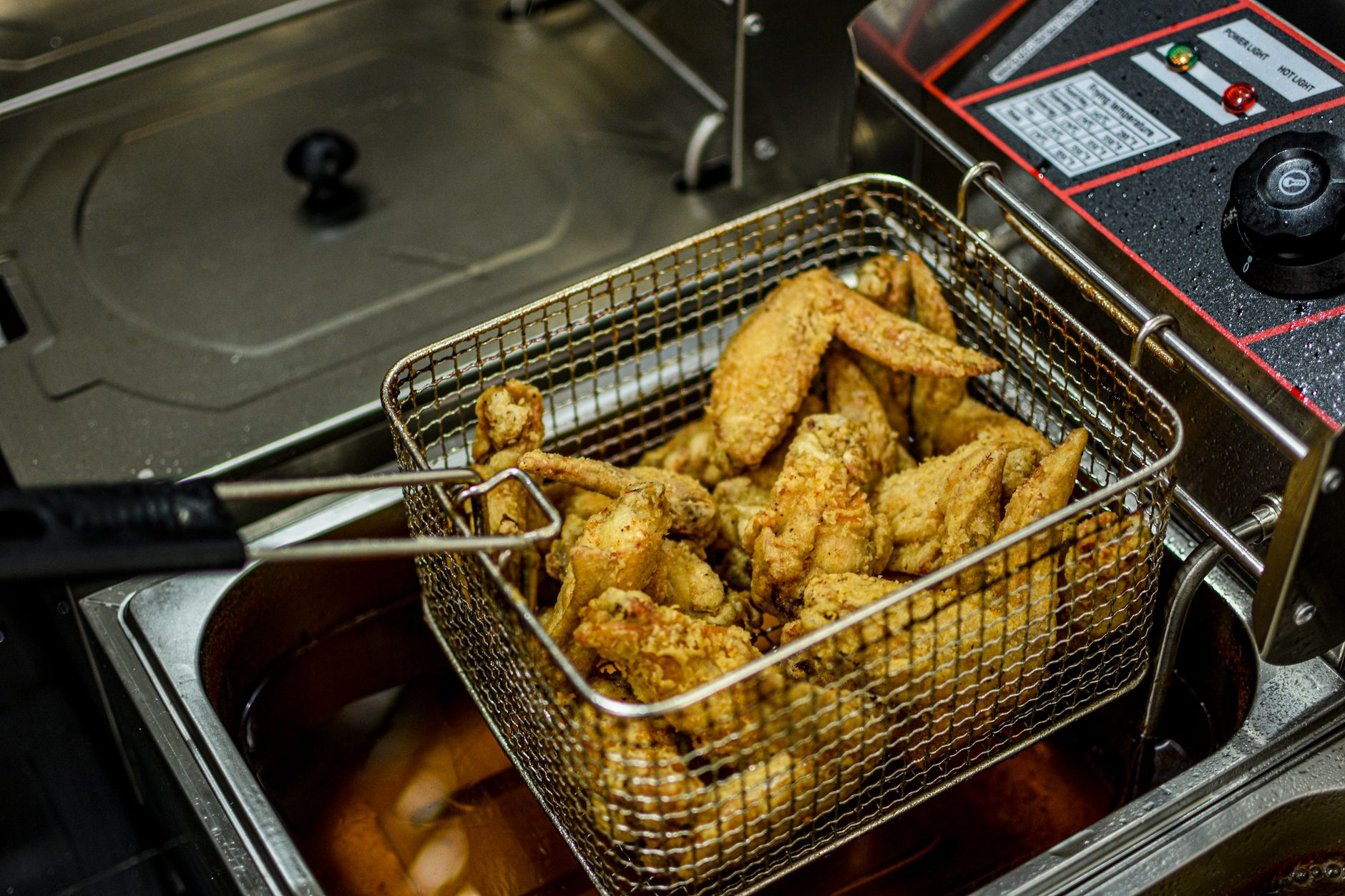 Golden crispy chicken prepared in Havells air fryer with less oil